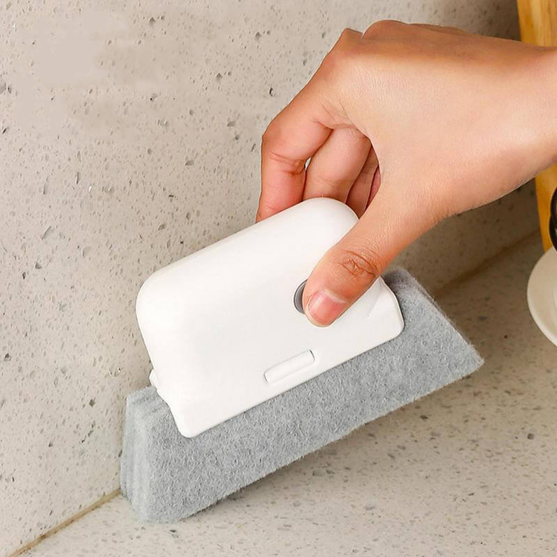 Borste för rengöring av fönsterspår