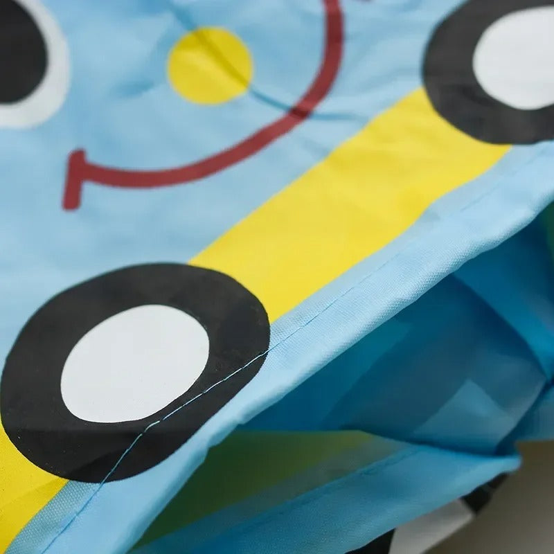 Tecknad regnkappa för barn