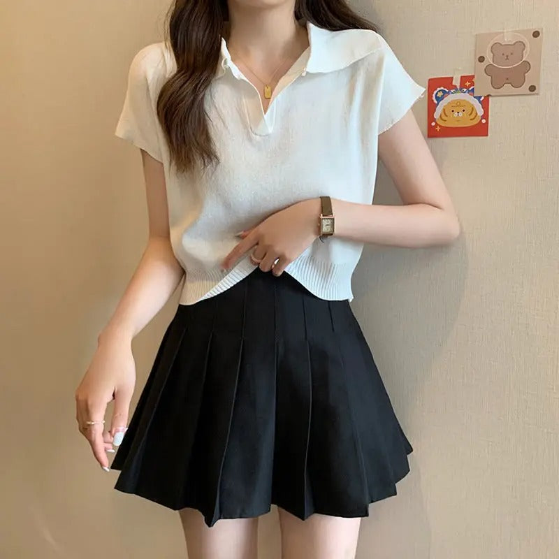 Kortärmad stickad polotröja för kvinnor