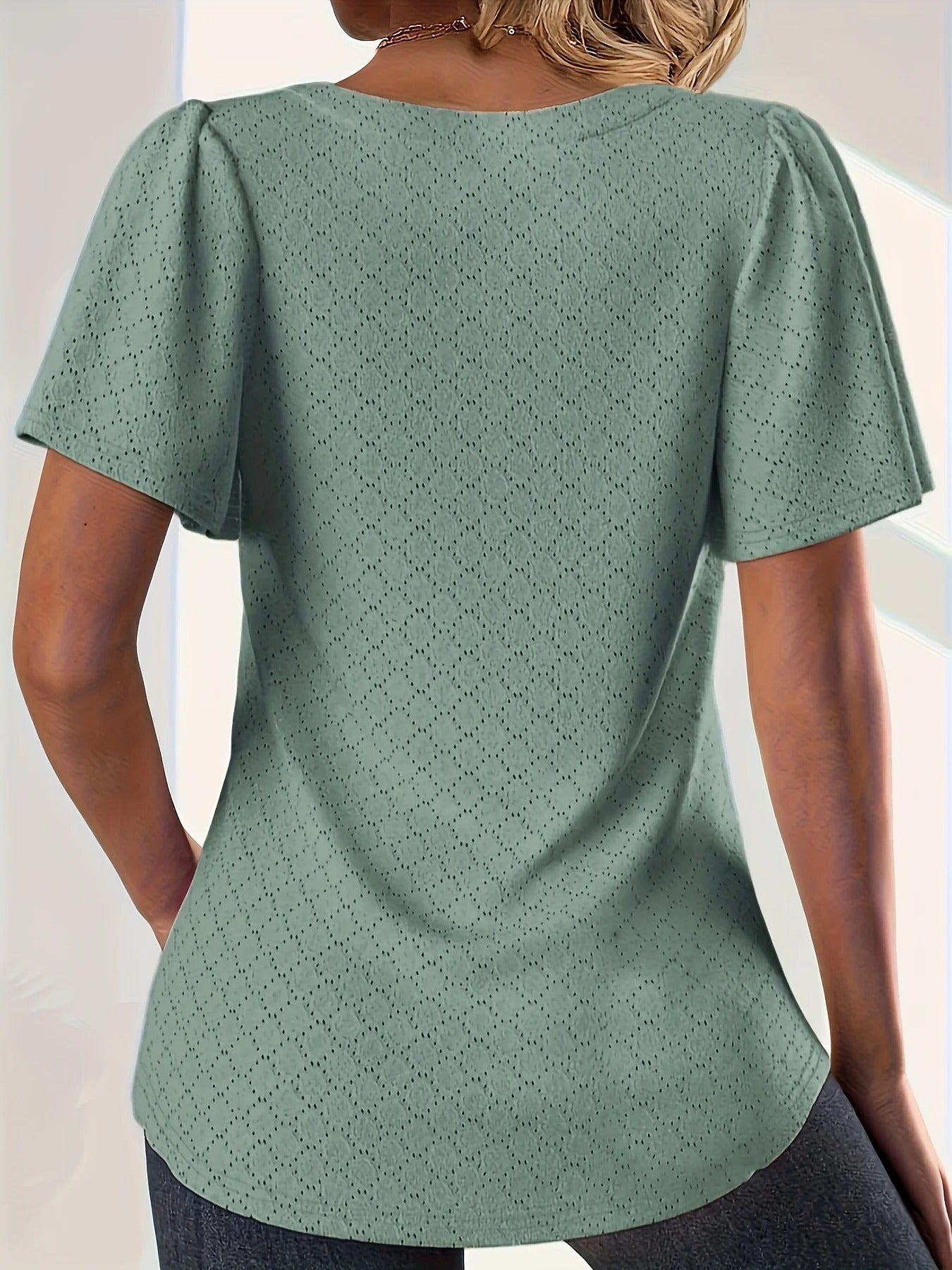 Hålbroderad topp med volanger för dam