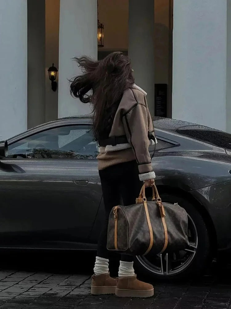 Lapeljacka i läder för kvinnor