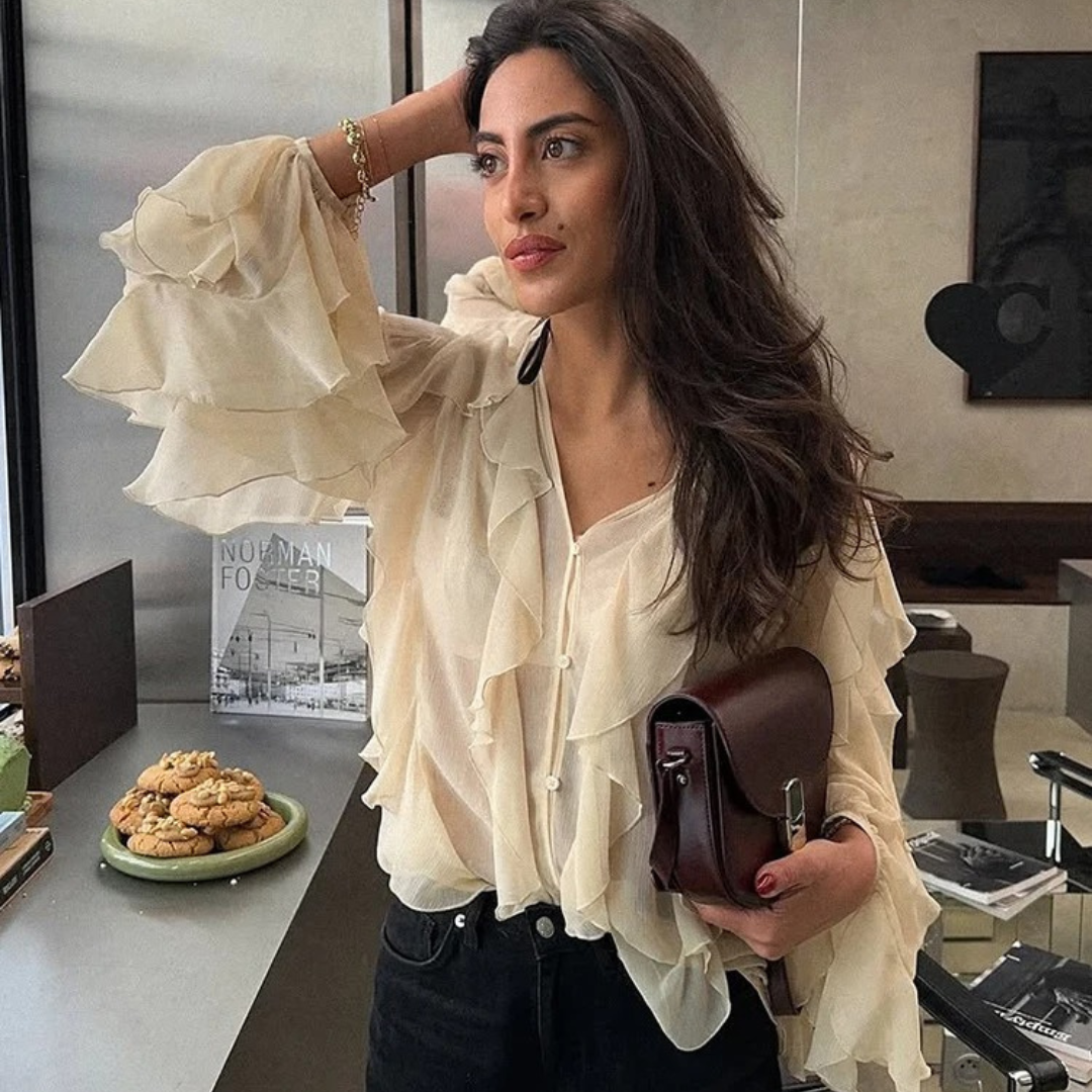 Genomskinlig lagrad blus för kvinnor