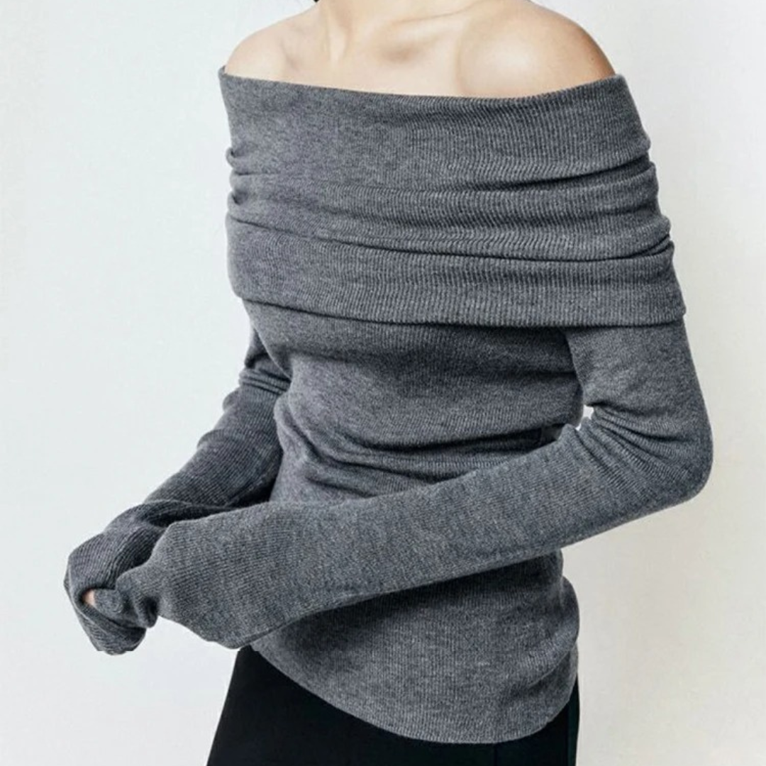 Stickad topp med snedställd hals för kvinnor