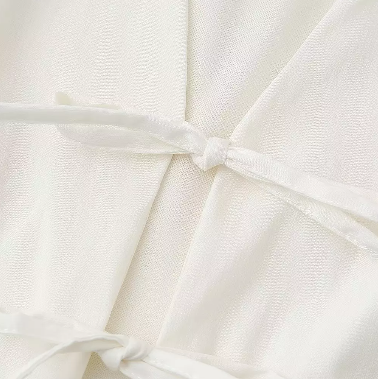 Ärmlös topp med V-ringad snörning för kvinnor