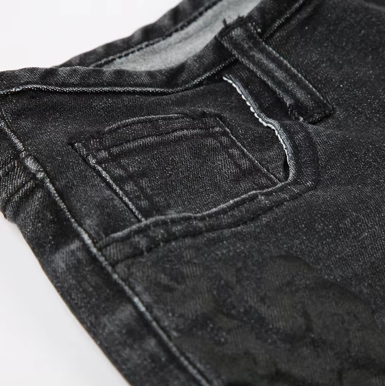 Blommiga jeansbyxor med låg upphov