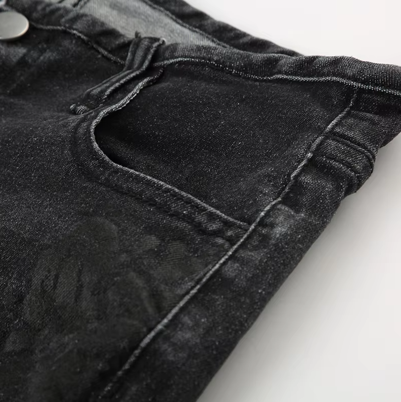 Blommiga jeansbyxor med låg upphov