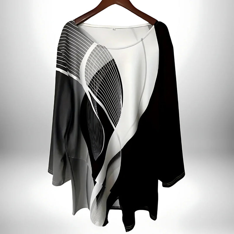Damernas långärmade topp med geometrisk design och asymmetrisk fåll 2