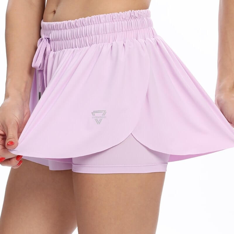 Kvinnors Fitnessshorts 2-i-1 Flowing 14