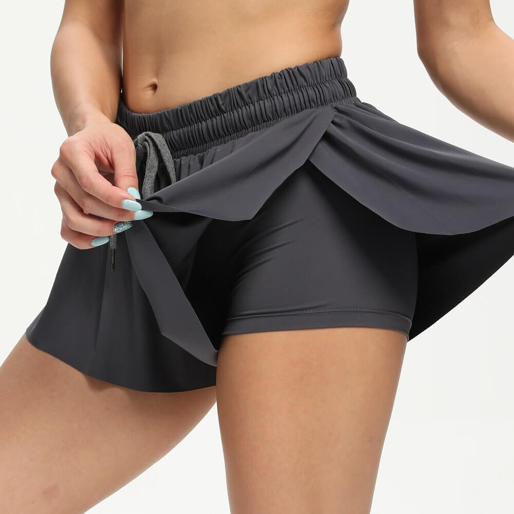Kvinnors Fitnessshorts 2-i-1 Flowing 7