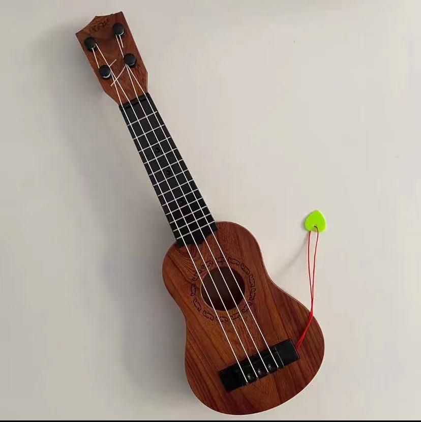 Mini Akustisk Ukulele för Barn och Nybörjare 9