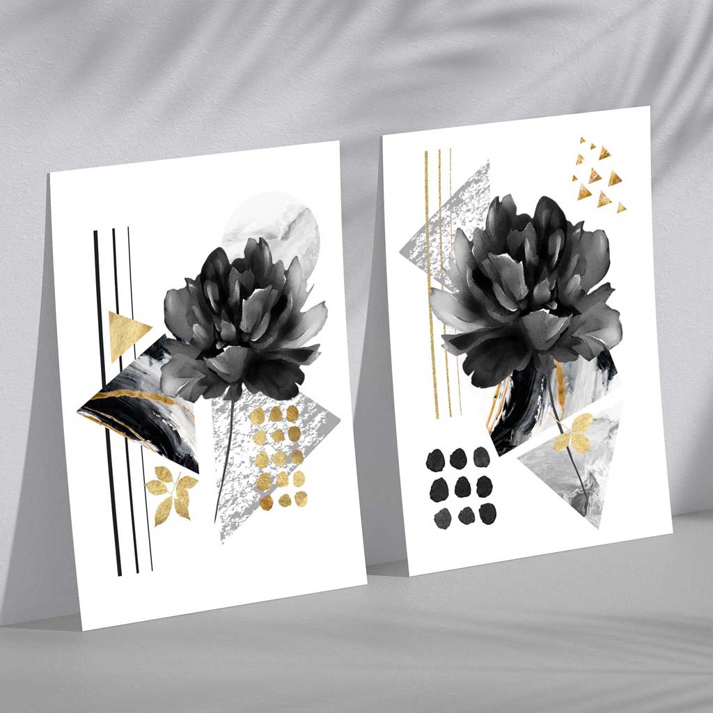 Set med 2 konsttryck av blommor i svart och guld 0