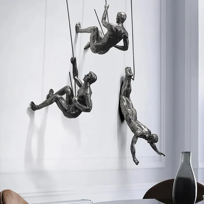 Väggdekoration för Klättrande Figur i Tredelad Design 1