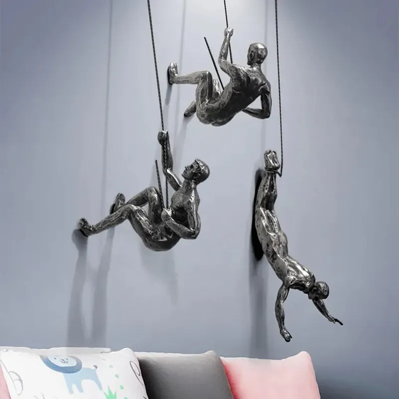 Väggdekoration för Klättrande Figur i Tredelad Design 6