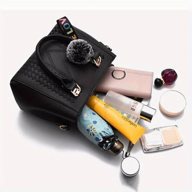 Broderad budbärarväska