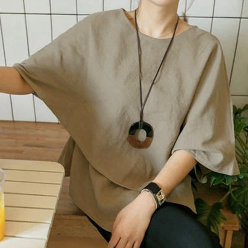 Asymmetrisk halvärmad blus för kvinnor