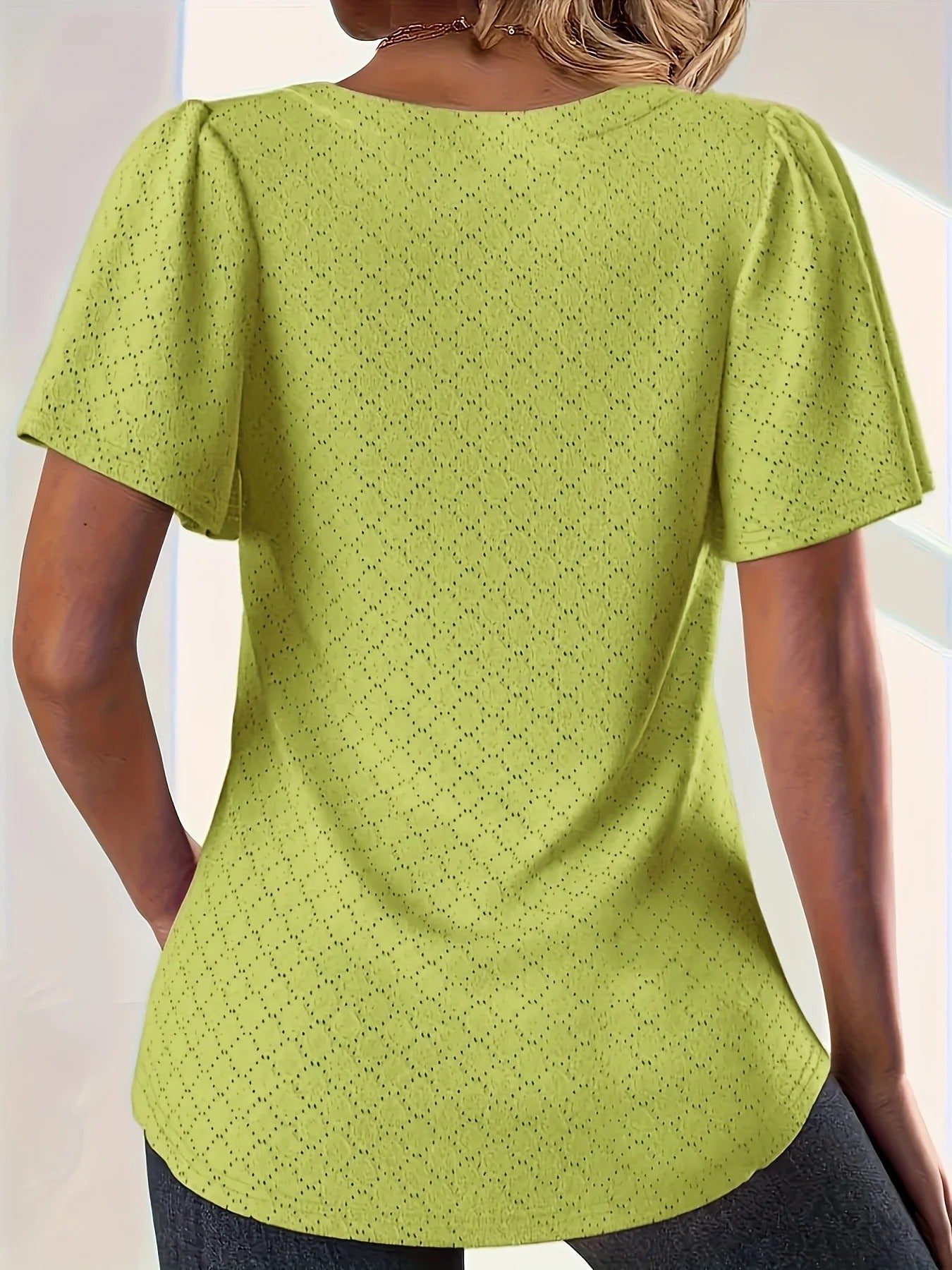 Hålbroderad topp med volanger för dam