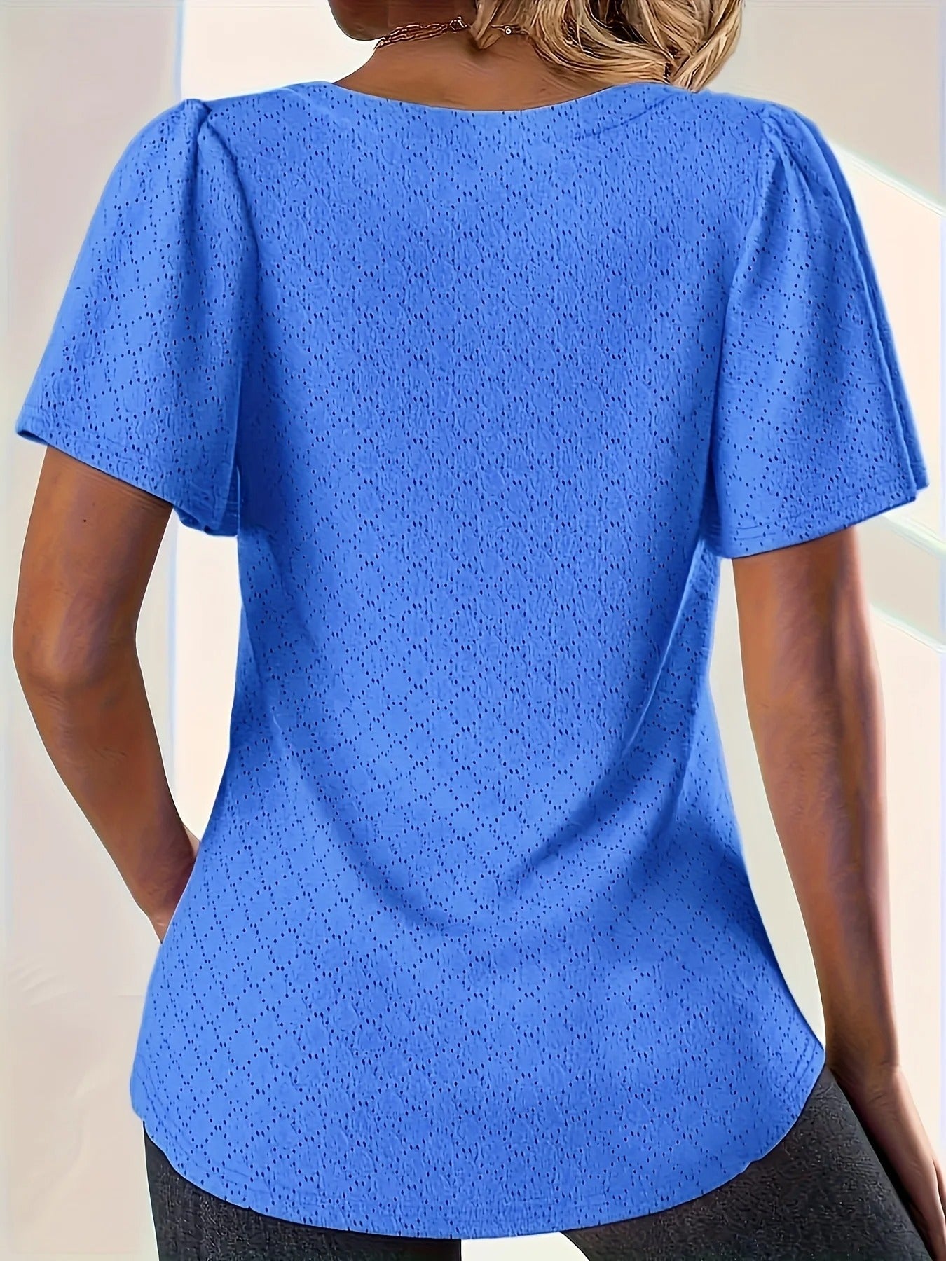 Hålbroderad topp med volanger för dam