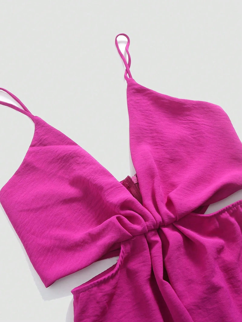 Urholkad plisserad jumpsuit med vida ben