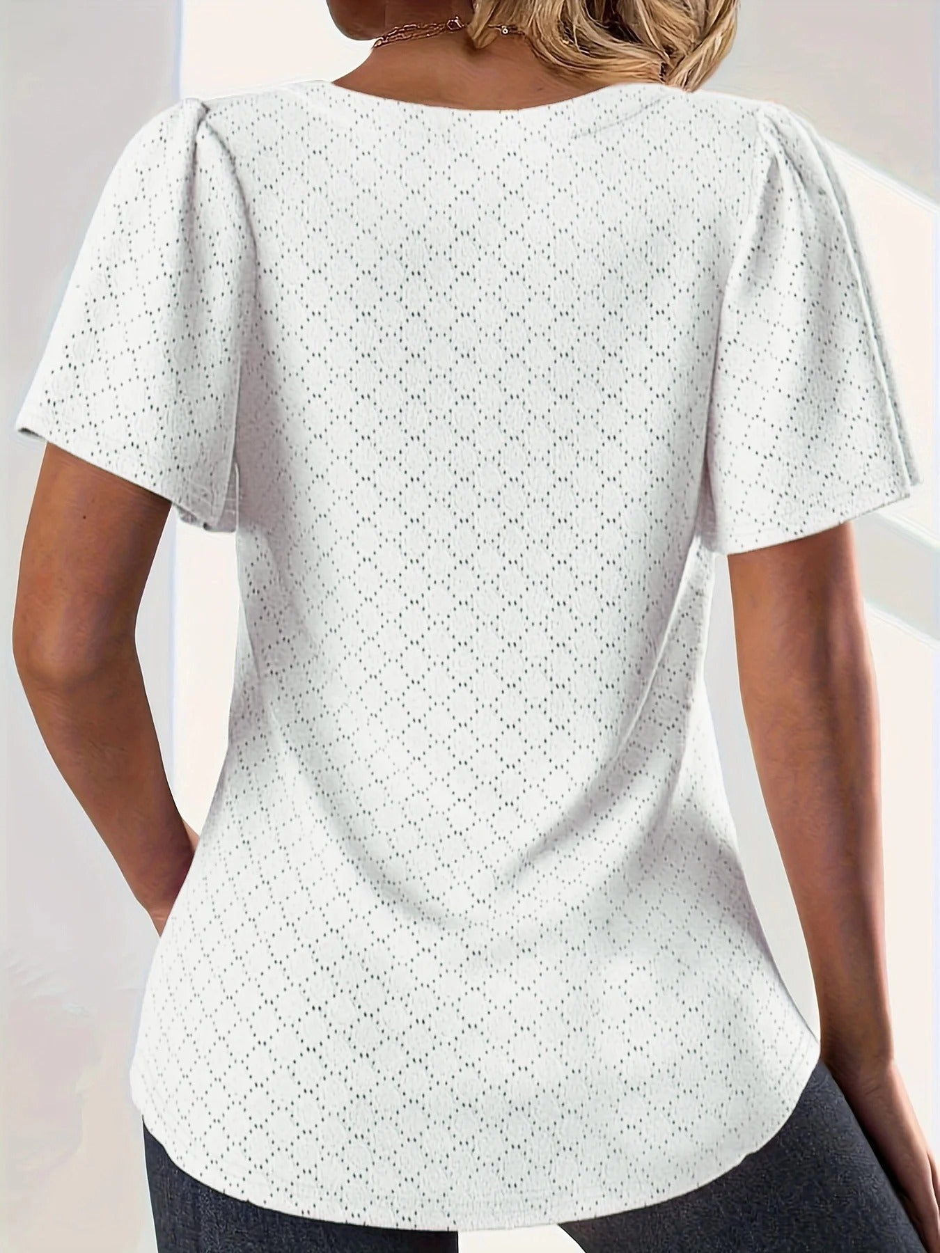 Hålbroderad topp med volanger för dam