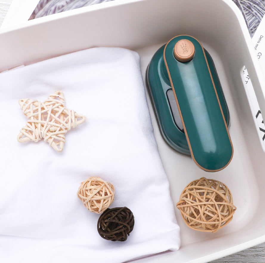 Handhållen ångmaskin för kläder