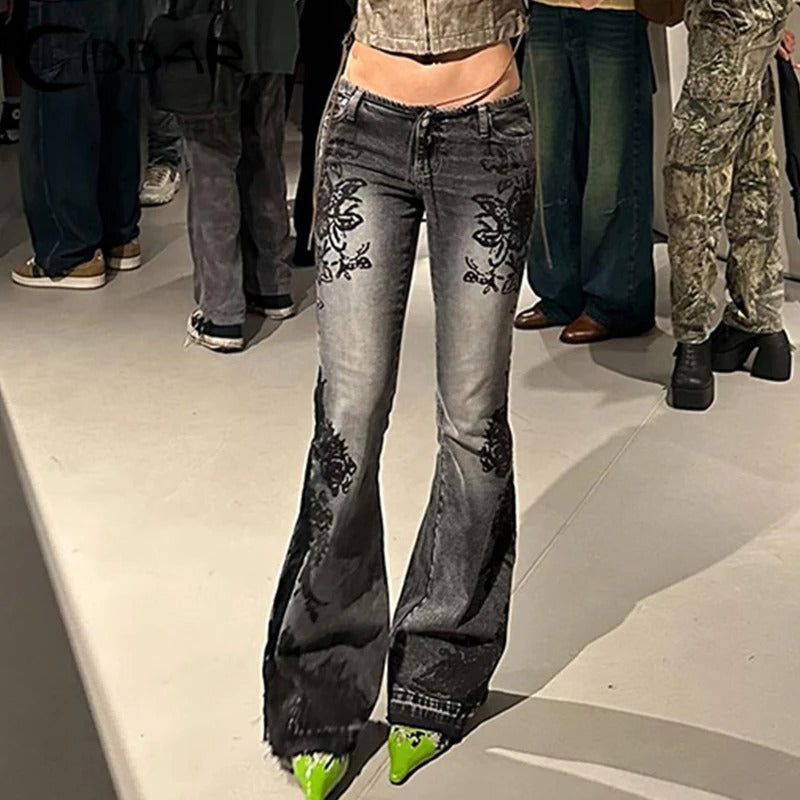 Blommiga jeansbyxor med låg upphov