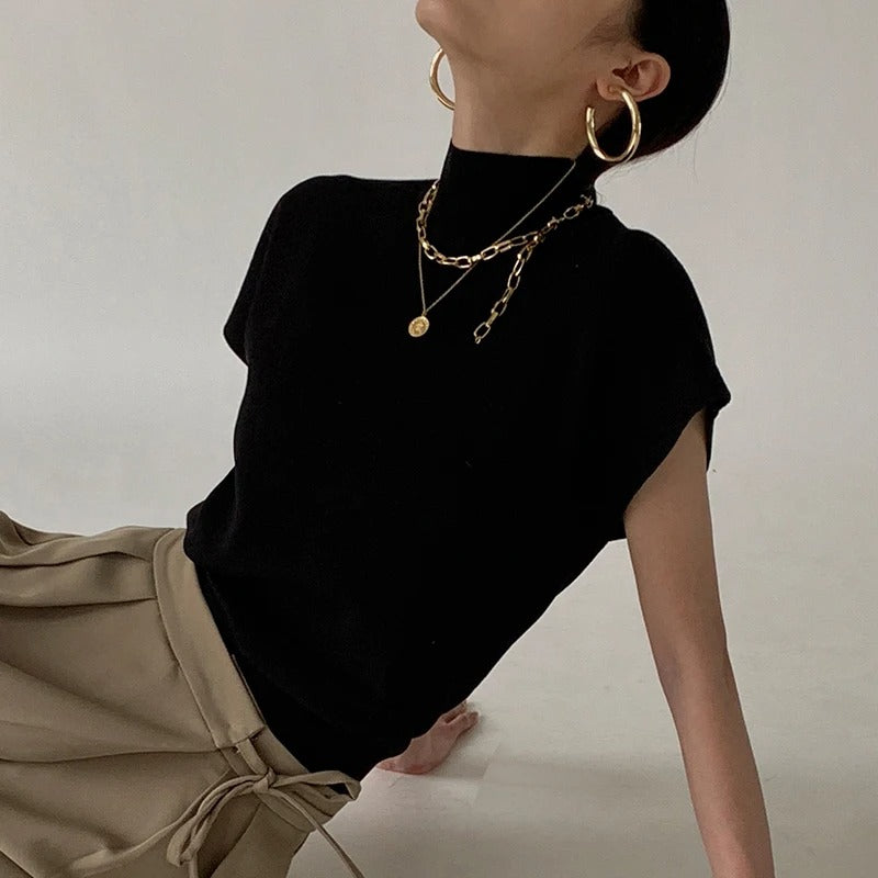 Kortärmad stickad topp med sköldpaddshals för kvinnor