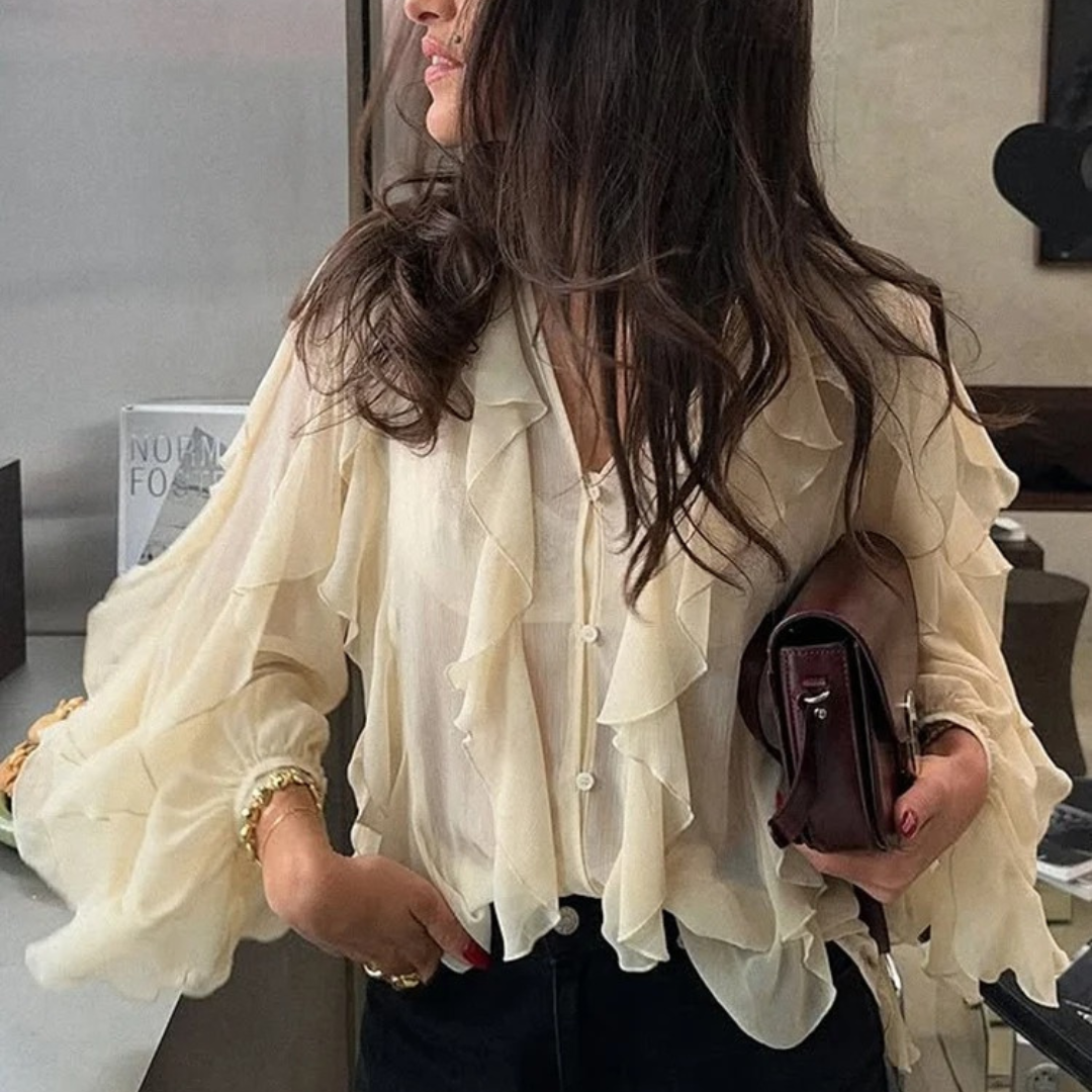 Genomskinlig lagrad blus för kvinnor