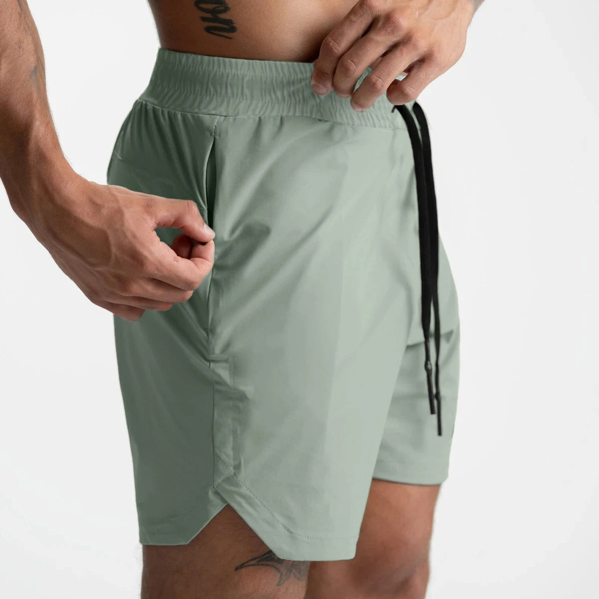 Snabborkande sportshorts för män