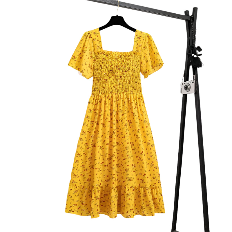 Midiklänning i blommig chiffong för kvinnor