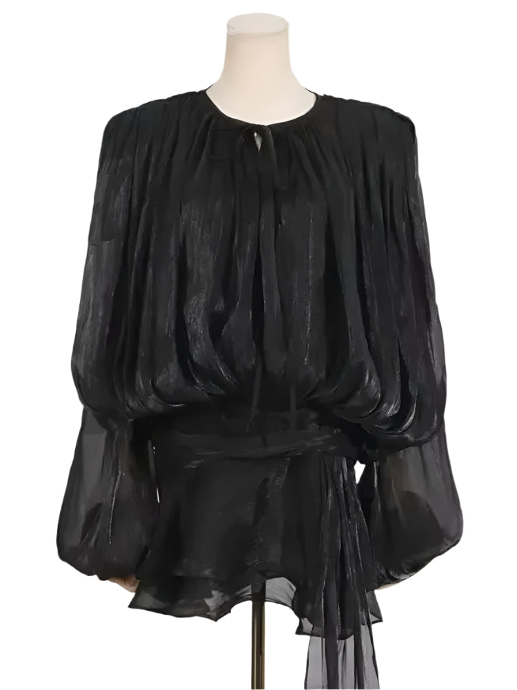 Damklänning med snörning och lanternärmar