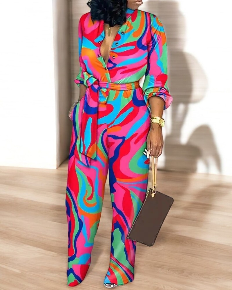 Jumpsuit med hög midja och V-hals med modetryck