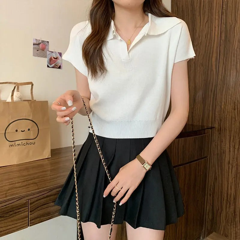 Kortärmad stickad polotröja för kvinnor