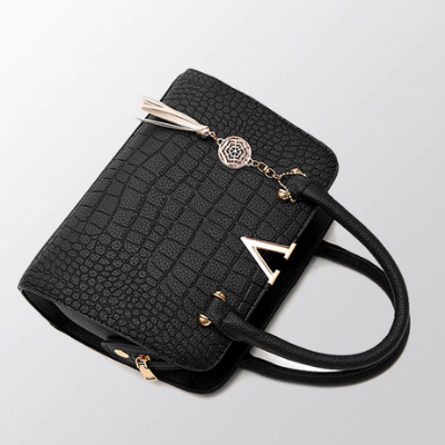 Väska i krokodilskinn