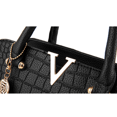 Väska i krokodilskinn