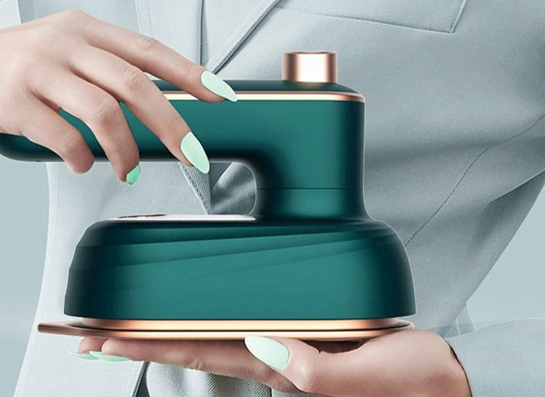 Handhållen ångstrykjärn