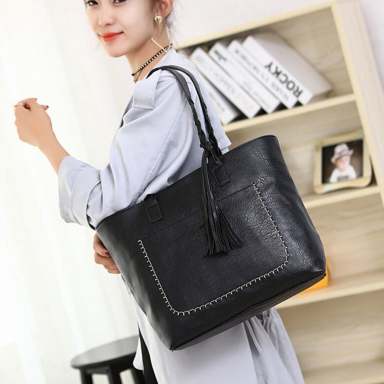 Skulderväska i läder för kvinnor